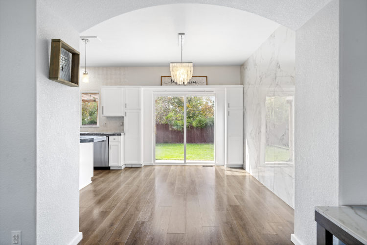Bright dining area with wood floors